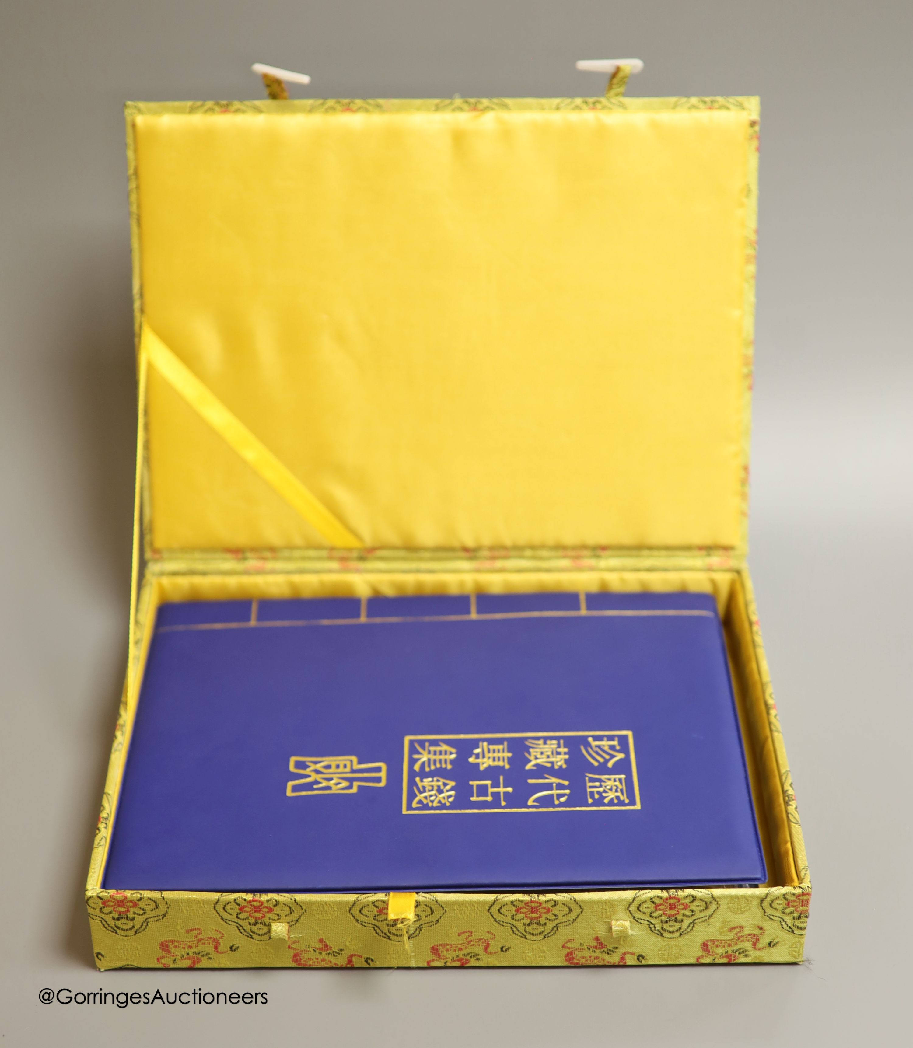 A collection of Chinese coins, cowrie shell currency and banknotes, Shang dynasty to PRC period